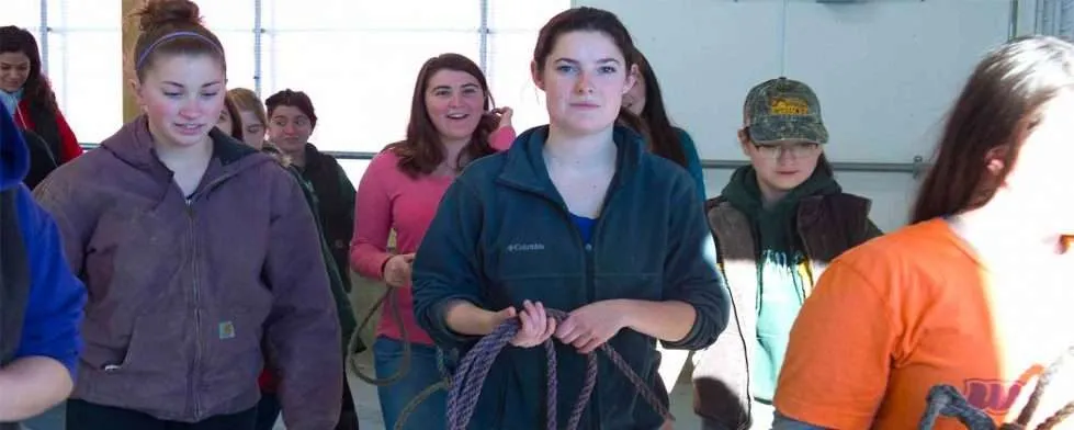 Students getting ready to work on a farm